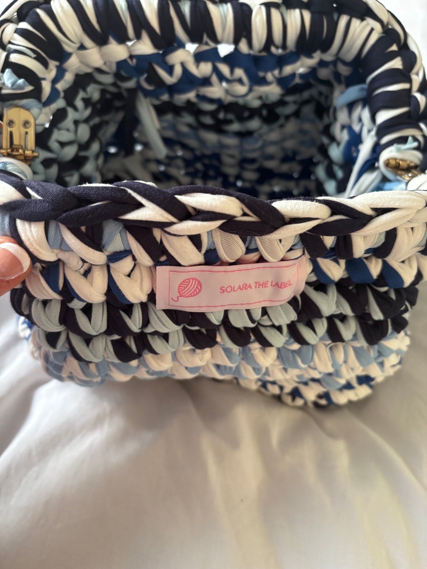 Blue mirage clutch bag