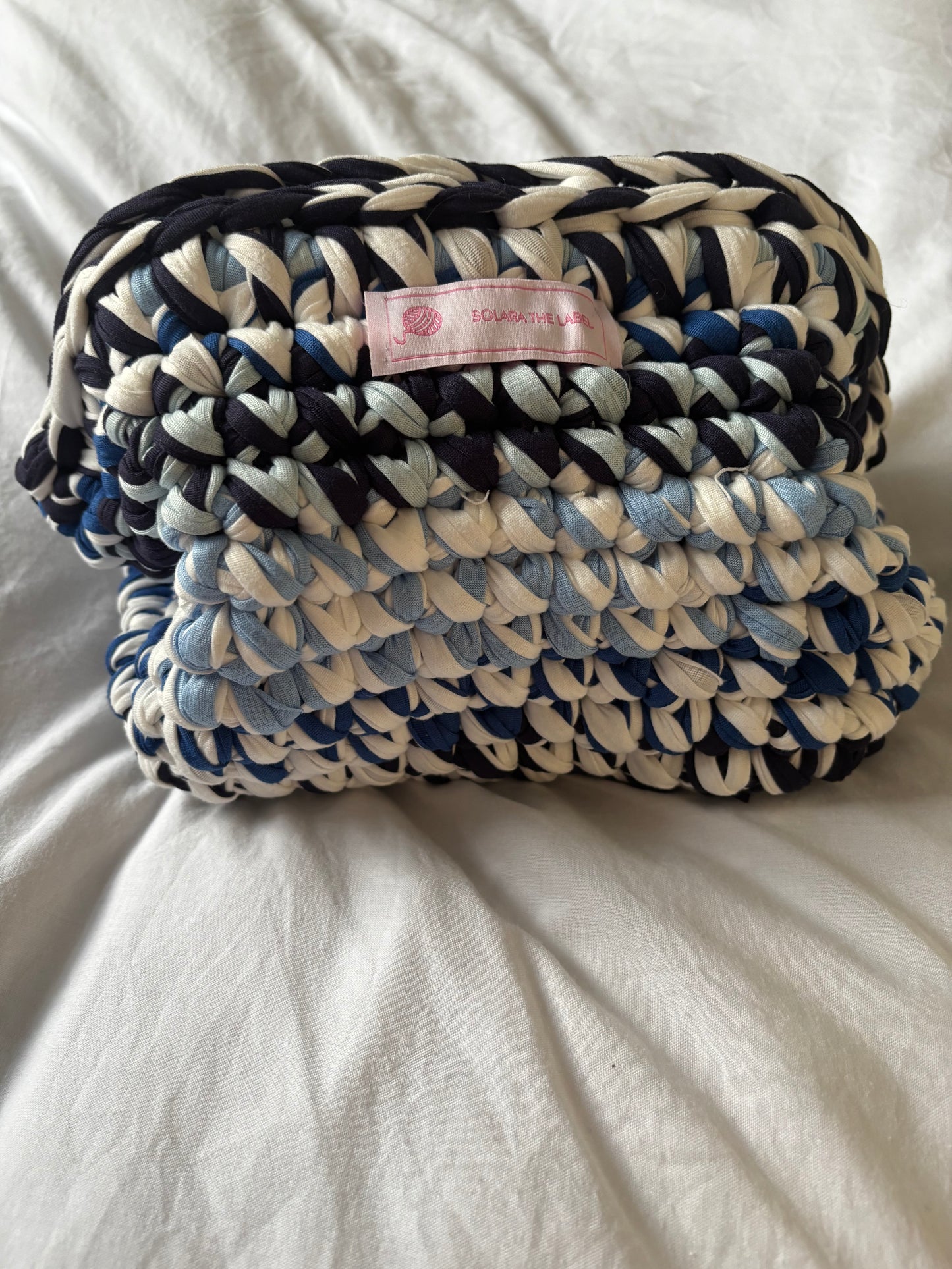 Blue mirage clutch bag